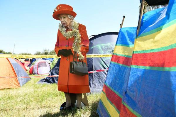 A cardboard cut-out depicting Britain's Queen Elizabeth II at the camping site. AFP