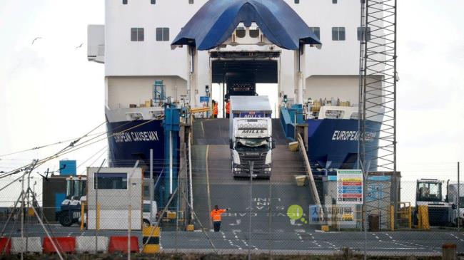 Lorries leave a ferry at the Port of Larne, Northern Ireland Britain January 1, 2021.